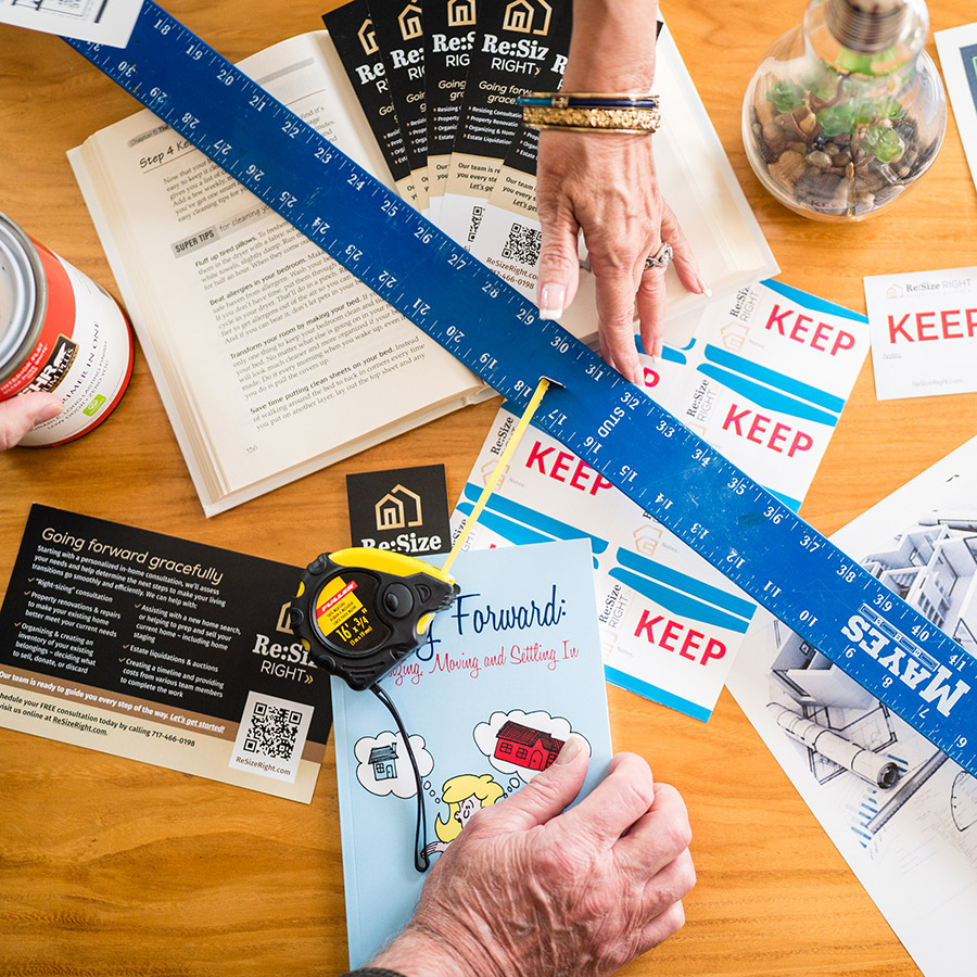 People in the process of downsizing consultation - items on a table